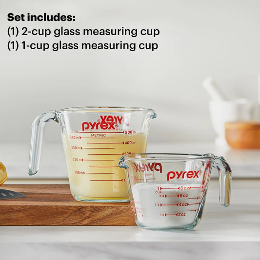 Smart Essentials Glass Measuring Cups with text what that set includes one each; 2-cup & 1-cup measuring cups